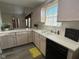 Kitchen with ample counter space, double sink, and neutral colored cabinets at 11523 Coastal Way, Indianapolis, IN 46229