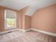 An empty bedroom with window and pink paint at 117 S Spencer Ave, Indianapolis, IN 46219