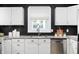 Close up on kitchen details including stainless steel appliances and granite countertops at 117 S Spencer Ave, Indianapolis, IN 46219