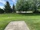 View of the lawn on the berm behind the house at 11711 Whisper Cove Dr, Fishers, IN 46037