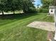Landscaped backyard with healthy lawn at 11711 Whisper Cove Dr, Fishers, IN 46037
