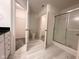 Well-appointed bathroom featuring a shower, toilet, and open doorway to a closet, perfect for everyday convenience at 11711 Whisper Cove Dr, Fishers, IN 46037