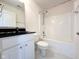 Clean bathroom with a vanity, toilet, and shower-tub combination offering both style and functionality at 11711 Whisper Cove Dr, Fishers, IN 46037