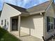 Covered side entrance of home, featuring siding, and brick details at 11711 Whisper Cove Dr, Fishers, IN 46037