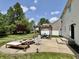 A spacious backyard with a patio, fire pit and ample grass at 12044 Bird Key Blvd, Fishers, IN 46037