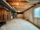 Unfinished basement with concrete walls and floors, and exposed ceiling at 12044 Bird Key Blvd, Fishers, IN 46037