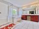 Bright bathroom boasts double sink vanity, soaking tub, and separate glass shower at 12044 Bird Key Blvd, Fishers, IN 46037