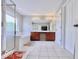 Bright bathroom boasts double sink vanity, soaking tub, and separate glass shower at 12044 Bird Key Blvd, Fishers, IN 46037