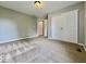 A bedroom showcasing plush carpeting, neutral paint, and a double closet at 12044 Bird Key Blvd, Fishers, IN 46037