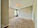 A neutral toned bedroom with carpet flooring and natural light from one window at 12044 Bird Key Blvd, Fishers, IN 46037