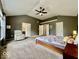 This expansive bedroom is filled with carpet, natural light, and neutral-toned walls at 12044 Bird Key Blvd, Fishers, IN 46037