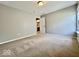 Spacious bedroom featuring plush carpeting, neutral paint, and bright natural light at 12044 Bird Key Blvd, Fishers, IN 46037