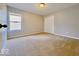 Cozy bedroom featuring neutral walls, carpet, large closet, and natural light at 12044 Bird Key Blvd, Fishers, IN 46037
