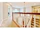 Upper foyer with chandelier, window nook, and staircase at 12044 Bird Key Blvd, Fishers, IN 46037