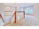 Upper foyer with chandelier, window nook, and staircase at 12044 Bird Key Blvd, Fishers, IN 46037