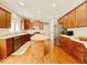 Spacious kitchen with wooden cabinets, stainless steel appliances, and center island at 12044 Bird Key Blvd, Fishers, IN 46037