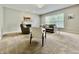 Bright living room with fireplace, large windows, neutral paint and carpet, and comfortable seating at 12044 Bird Key Blvd, Fishers, IN 46037