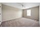 Neutral bedroom with carpet, large window, and ample space at 12331 Chiseled Stone Dr, Fishers, IN 46037