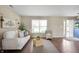 Cozy living room featuring modern decor, hardwood flooring, and an inviting atmosphere at 12331 Chiseled Stone Dr, Fishers, IN 46037