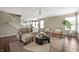 Inviting living room with comfortable seating, natural light, and seamless flow to the kitchen at 12331 Chiseled Stone Dr, Fishers, IN 46037