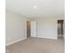 Bright bedroom with plush carpeting and a view into an ensuite bathroom at 1237 Langham St, Avon, IN 46123