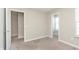 A bedroom features carpet flooring and two door ways at 1237 Langham St, Avon, IN 46123