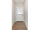 Entryway with wood-look floors and a front door with a window at 1237 Langham St, Avon, IN 46123