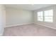 Bedroom with neutral carpet, two windows allowing natural light at 1280 Newton St, Avon, IN 46123