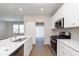 Well-equipped kitchen with granite countertops and stainless steel appliances at 1280 Newton St, Avon, IN 46123