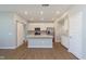 Modern kitchen with stainless steel appliances, kitchen island, and ample cabinet space at 1280 Newton St, Avon, IN 46123