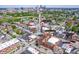 An aerial neighborhood view of businesses and eateries, including Revolucion, Kuma's Corner, and Bovaconti Coffee at 1310 Olive St, Indianapolis, IN 46203