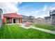 Inviting backyard featuring a metal pool, fire pit, and covered patio, ideal for relaxation and entertainment at 1310 Olive St, Indianapolis, IN 46203