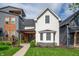 Charming two-story home with a welcoming front porch and nicely manicured front yard at 1310 Olive St, Indianapolis, IN 46203