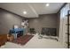 Multi-purpose basement space with area for gym equipment, storage, and laundry at 13244 Snow Owl Dr, Carmel, IN 46033