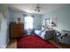 This bedroom features a daybed, a vintage dresser, and posters at 13244 Snow Owl Dr, Carmel, IN 46033