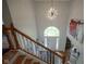 Grand foyer with soaring ceilings, modern chandelier, and staircase with wood and white railings at 13244 Snow Owl Dr, Carmel, IN 46033