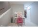 Cozy hallway with a workstation decorated with an abstract art piece and modern lighting at 13244 Snow Owl Dr, Carmel, IN 46033