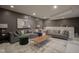 Spacious living room with comfortable seating, contemporary decor, and soft, recessed lighting at 13244 Snow Owl Dr, Carmel, IN 46033