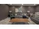 Comfortable living room with contemporary decor and recessed lighting at 13244 Snow Owl Dr, Carmel, IN 46033