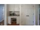 Bright office featuring custom built-ins and desk space with a hexagonal backsplash and ample cabinet space at 13244 Snow Owl Dr, Carmel, IN 46033