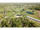 Drone's eye view featuring the airstrip, modern homes and the serene natural surroundings of the area at 1340 Apache Trl, Martinsville, IN 46151