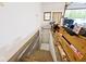 Basement stairs lead down, showcasing potential for storage or expanded living space at 1340 Apache Trl, Martinsville, IN 46151