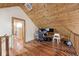 Unique bonus room featuring wood ceiling, hardwood floor, and ample space for versatile usage at 1340 Apache Trl, Martinsville, IN 46151
