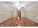 Spacious bonus room with hardwood floors and abundant natural light, perfect for flexible living at 1340 Apache Trl, Martinsville, IN 46151