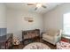 Bright Bedroom with ceiling fan, crib, chair, and whimsical decor for a cozy, playful space at 1483 Paper Birch Dr, Sheridan, IN 46069