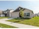 Attractive single-Gathering home with a well-maintained lawn, attached garage and welcoming front entrance at 1483 Paper Birch Dr, Sheridan, IN 46069