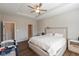 Spacious primary bedroom with a ceiling fan and a comfortable king-sized bed at 1483 Paper Birch Dr, Sheridan, IN 46069