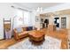 Bright living room featuring hardwood floors and an open layout with access to the kitchen at 1730 Hoyt Ave, Indianapolis, IN 46203