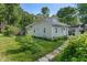 Well-maintained backyard with lush greenery and a serene, private atmosphere at 1802 E 66Th St, Indianapolis, IN 46220