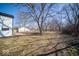 Expansive backyard with lots of space featuring mature trees and great potential for landscaping or recreation at 1808 Raible Ave, Anderson, IN 46011